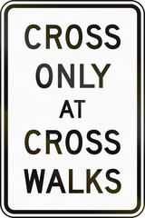 United States traffic sign: Cross only at cross walks