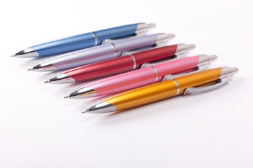 Ballpoint pens on table