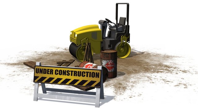 under construction sign and road roller construction machine