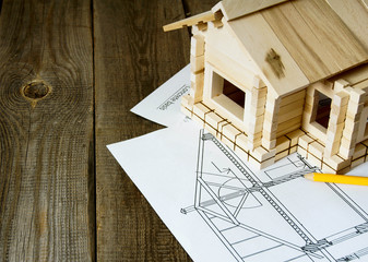 Many drawings for building and small house on old wooden