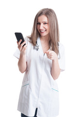 Woman or female doctor using smartphone