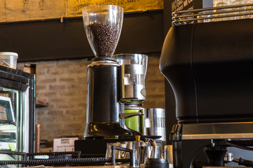 espresso coffee machine with roasted coffee beansv,