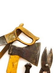 Vintage working tools ( axe, saw and others) on white background