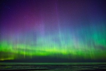 Beautiful Aurora Borealis over sea - obrazy, fototapety, plakaty