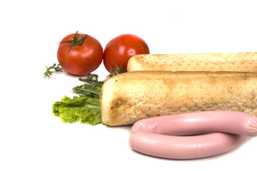 fresh tomatoes and hot sausage hot dog bun