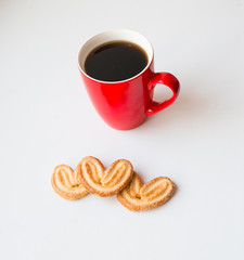 cup of coffee with biscuits