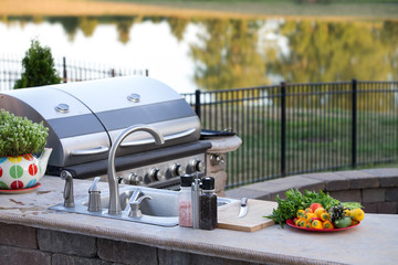 Preparing a healthy meal in an outdoor kitchen - 80580555