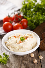 Hummus with vegetables and herbs