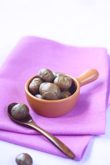 Peeled Chestnuts in a little ceramic pot
