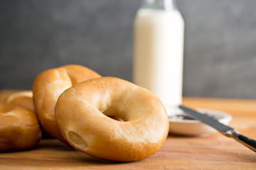 tasty bagels on kitchen table