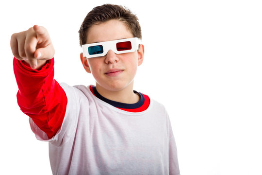 Boy wears 3D glasses and points looking confident