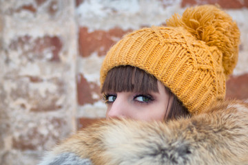 Portrait of beautiful girl in winter hat