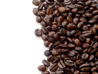 Brown coffee beans isolated on white background