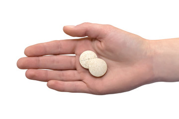 Photo of a hand with a tablet fiber top
