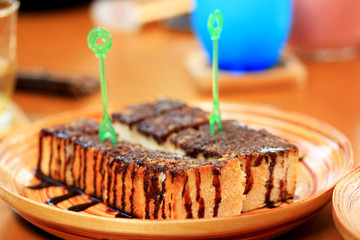 Toast bread topped with chocolate and butter.