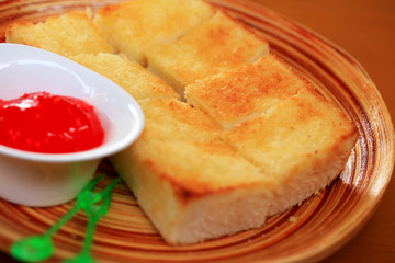 Toast bread and strawberry jam.