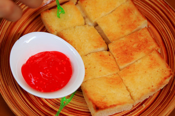 Toast bread and strawberry jam.