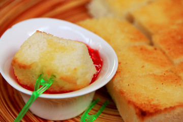 Toast bread and strawberry jam.