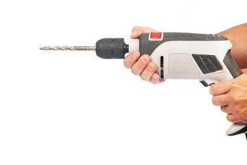 Hands holding drill