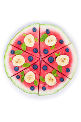 Watermelon pizza on white