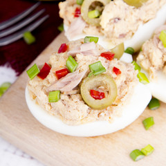 stuffed eggs with tuna, olives and paprica