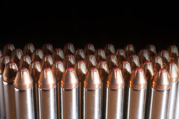 Red tipped bullets for a handgun