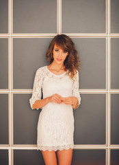 portrait of a cute girl in a bright dress