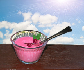 cream mousse with cranberries sky clouds