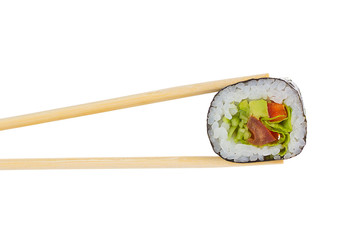 Sushi roll with chopsticks isolated on white