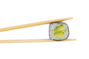 Sushi roll with chopsticks isolated on white