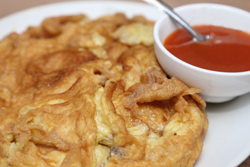 omelet with chili sauce