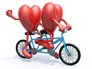 two hearts riding tandem bicycle