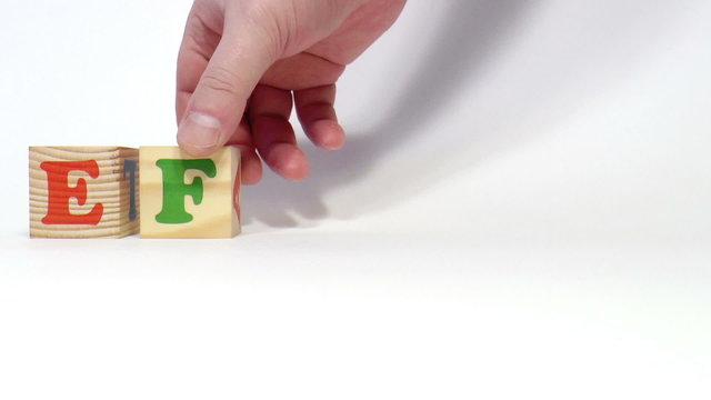 The video shows effect word built of wooden blocks