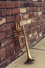 Fototapeta na wymiar Old Trumpet Brick Wall