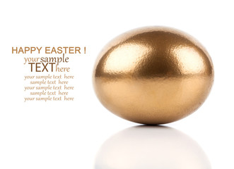 table decoration with easter eggs nest on plate, on white wooden