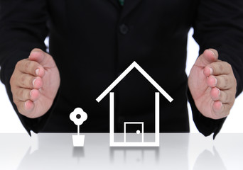 House insurance with businessman hand