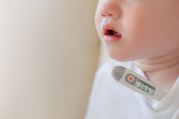 A child with a thermometer - 80599148
