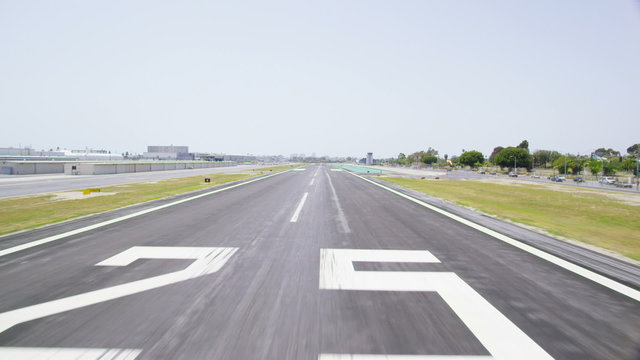 Aerial view of Californian Airport taking off from runway