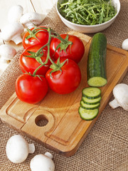 cucumbers, tomatoes, mushrooms and arugula