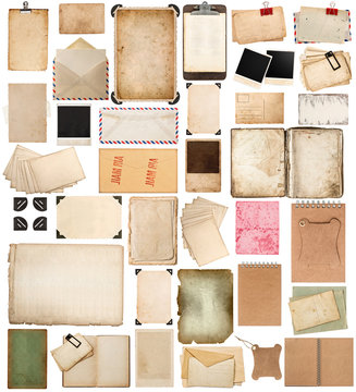 aged paper sheets, books, pages and old postcards isolated on wh