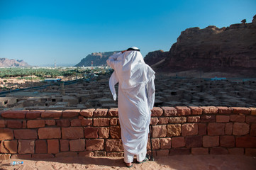 Saudian overlooking the old city of Al Ula, Saudi Arabia - obrazy, fototapety, plakaty
