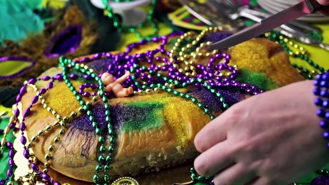 Table decorated for Mardi Gras party.