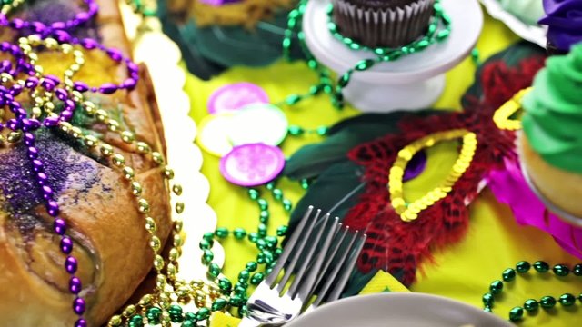 Table decorated for Mardi Gras party.