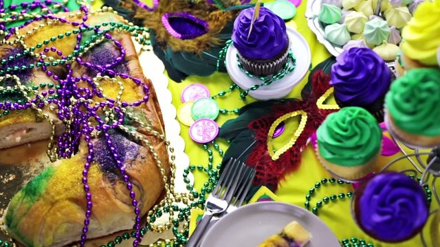 Table decorated for Mardi Gras party.
