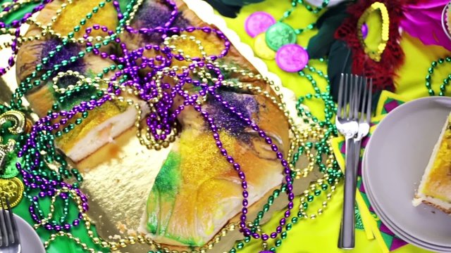 Table decorated for Mardi Gras party.