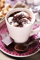 Hot chocolate with marshmallows in mug,