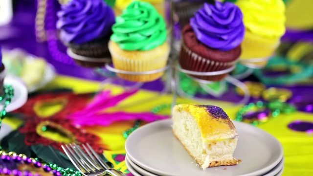 Table decorated for Mardi Gras party.