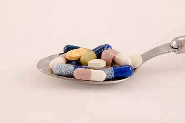 Pills on a spoon