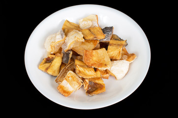 Vietnamese  deep fried dried Pangasius kunyit fish, ca dua kho c