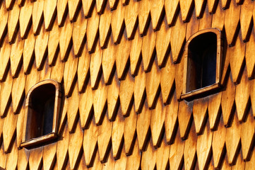 Norwegian wooden roof and small windows © mariuszks